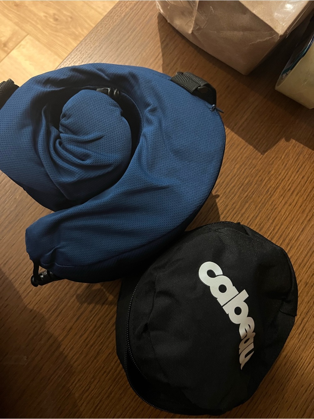 Cabeau Blue Travel Neck Pillow with Black Cabeau Carry Pouch